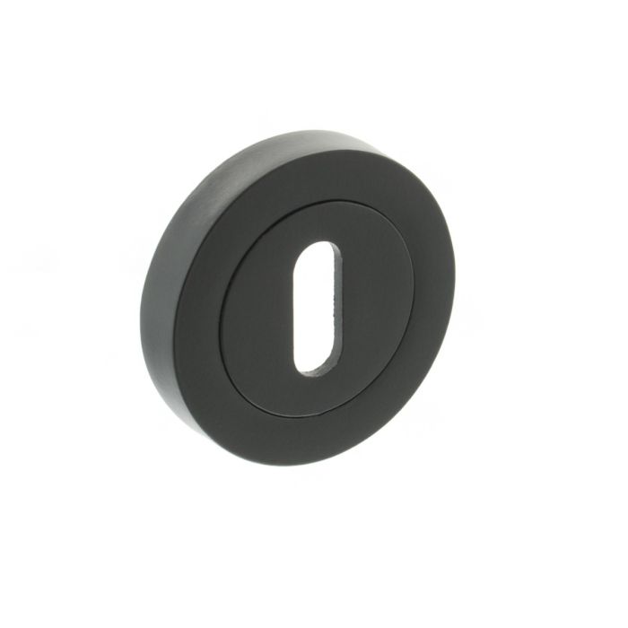 Atlantic Hardware Millhouse Brass Key Escutcheons on Round Rose